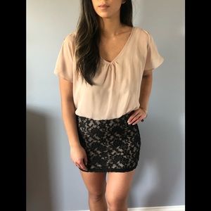 Cream top and black skirt one piece